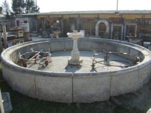 Large centerpiece fountain in reclaimed stone