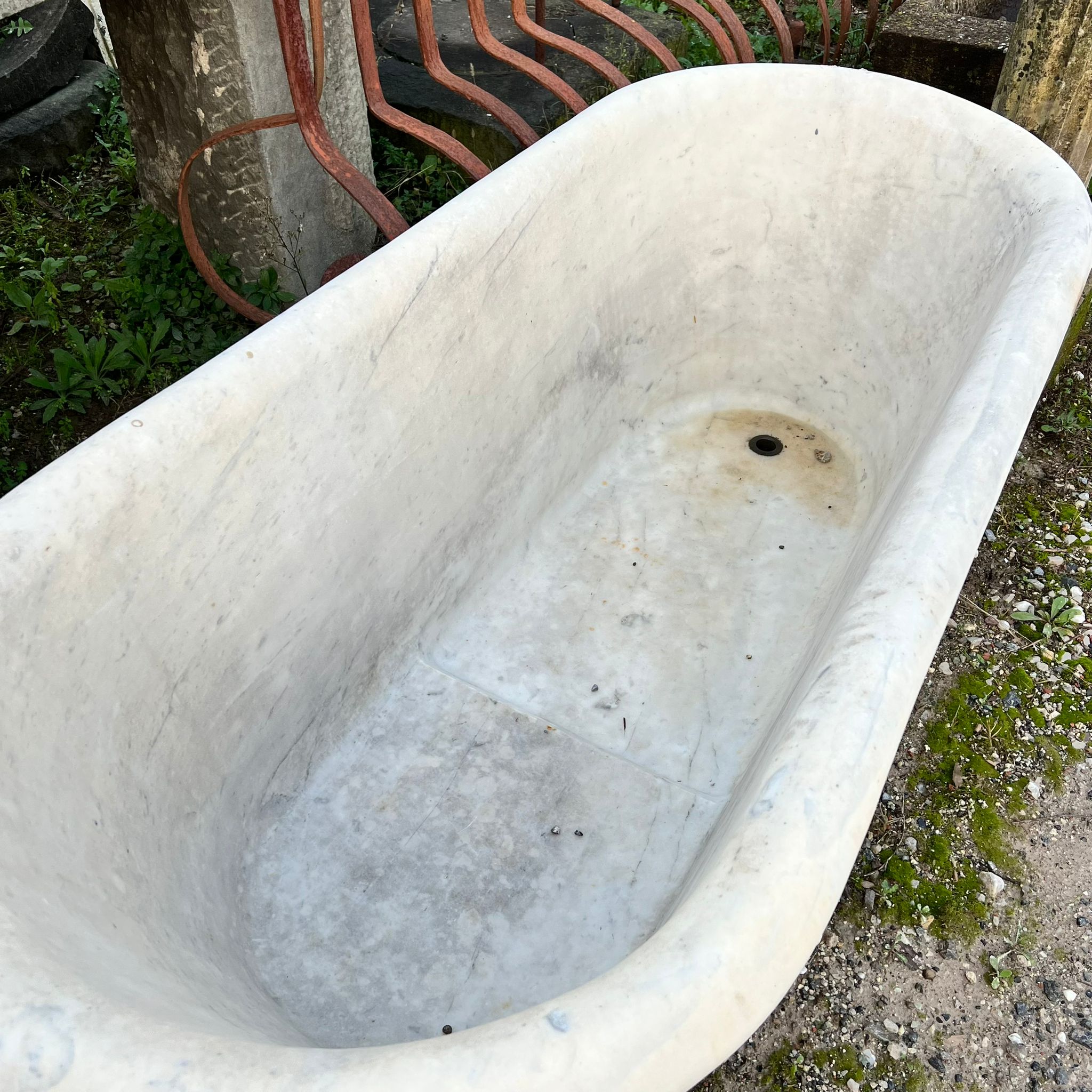 Sloping marble tub