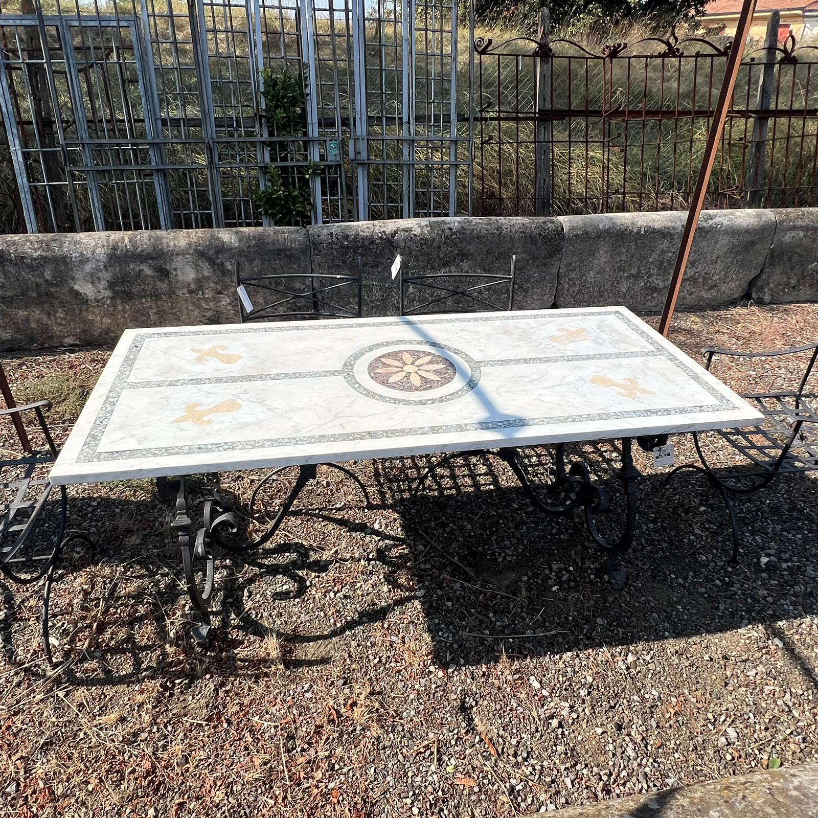 Antico tavolo e sedie in ferro 