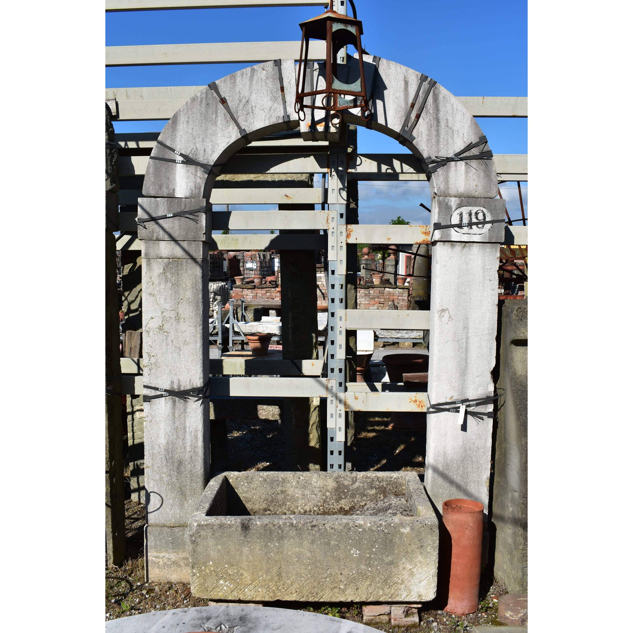Arched portal in light stone