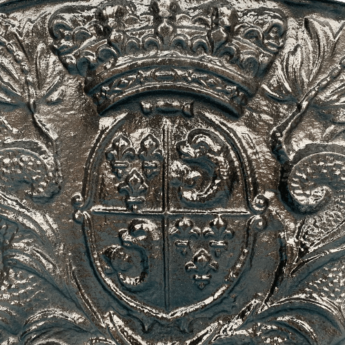 Dettaglio piastra da camino barocca 