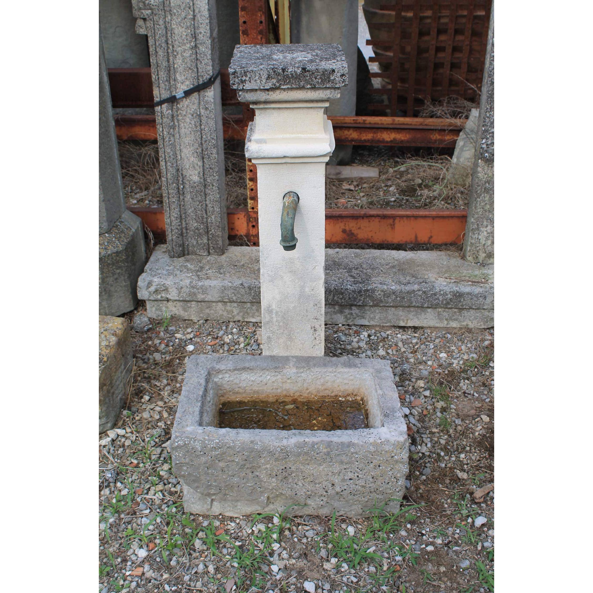 Ancient stone wall fountain