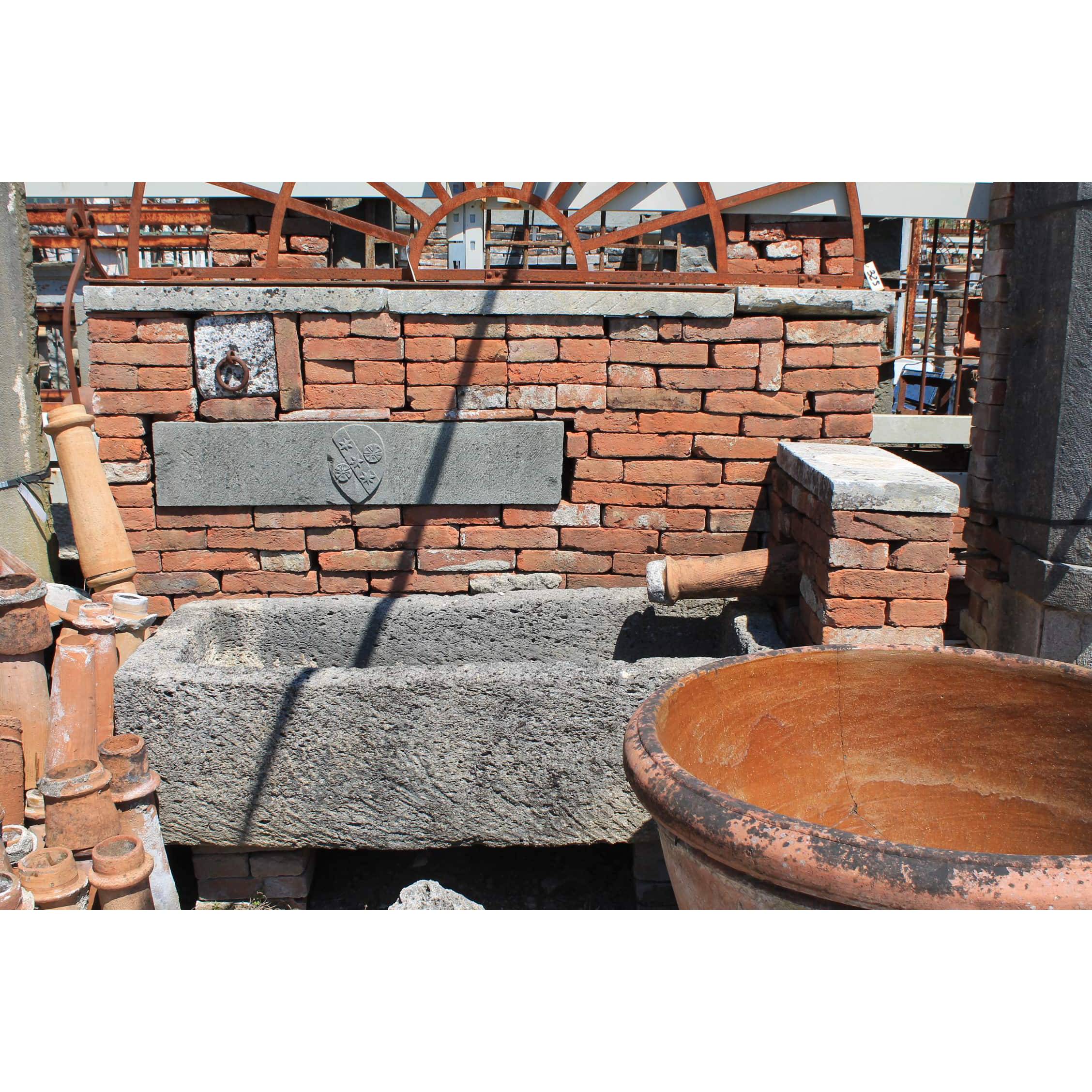 Wall fountain with brick front