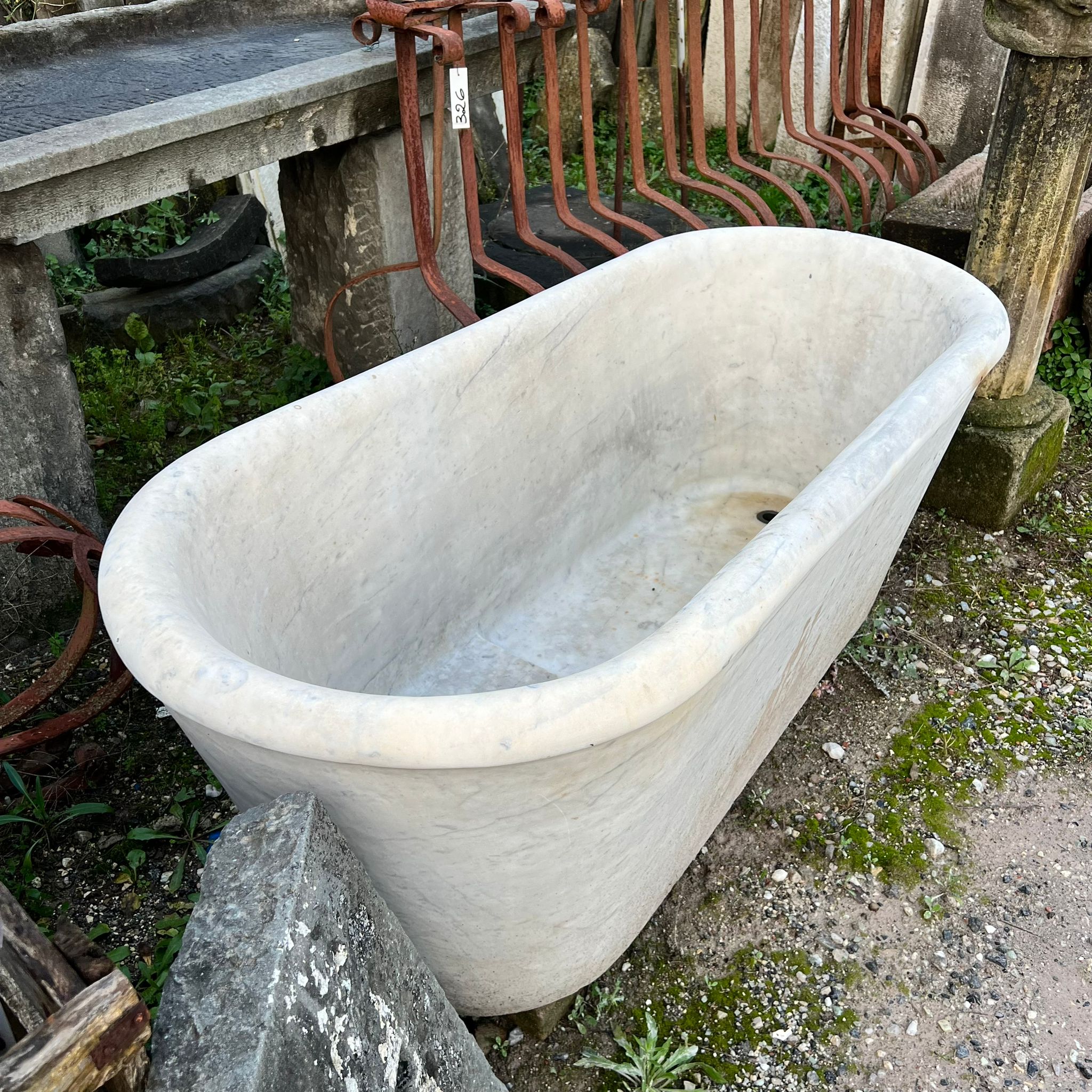Sloping marble tub
