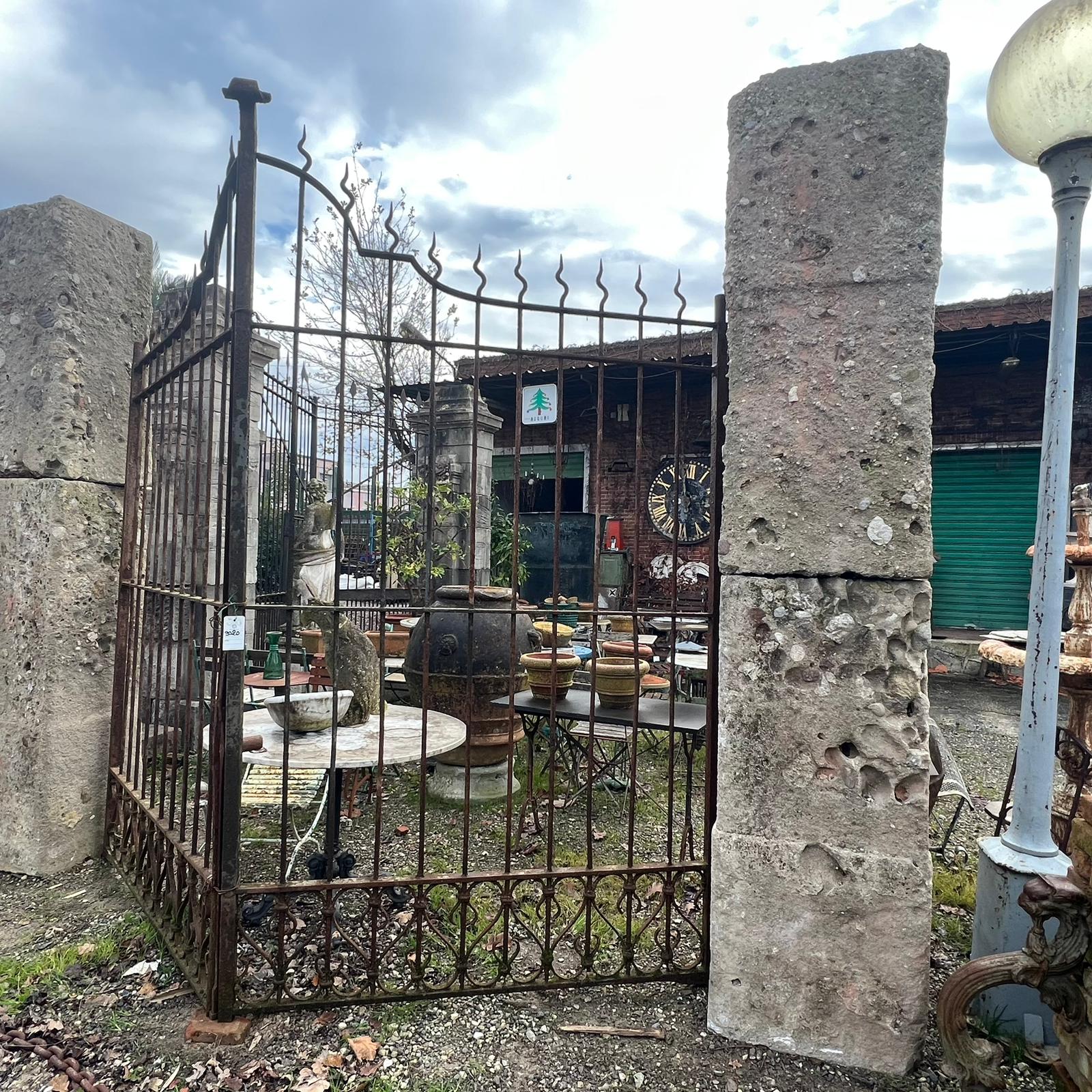 Reclaimed stone columns with gate