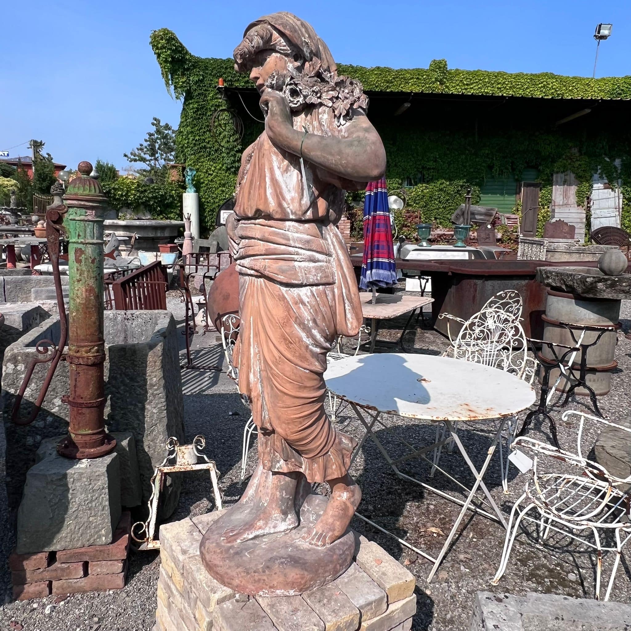 statua 