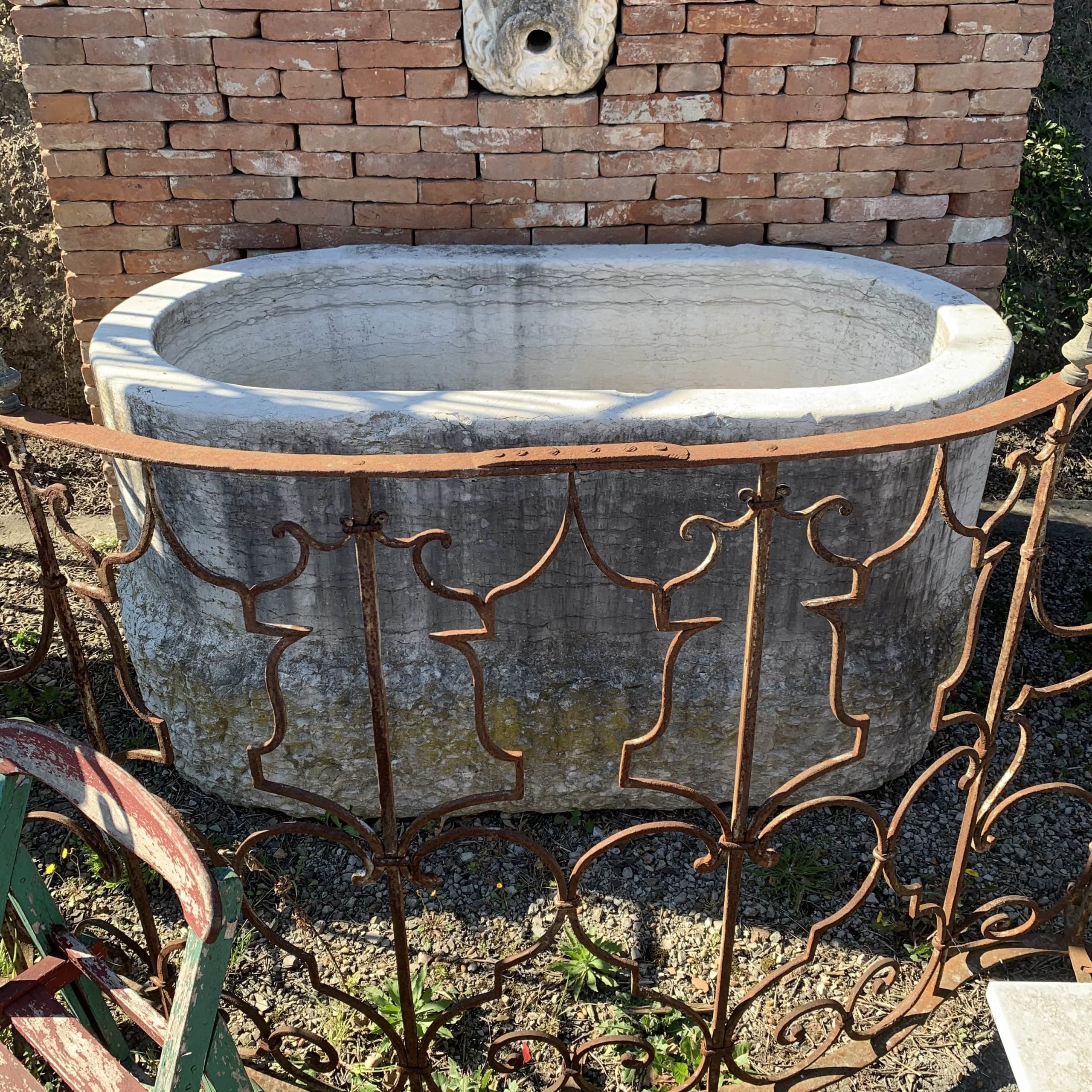 Oval white stone tub