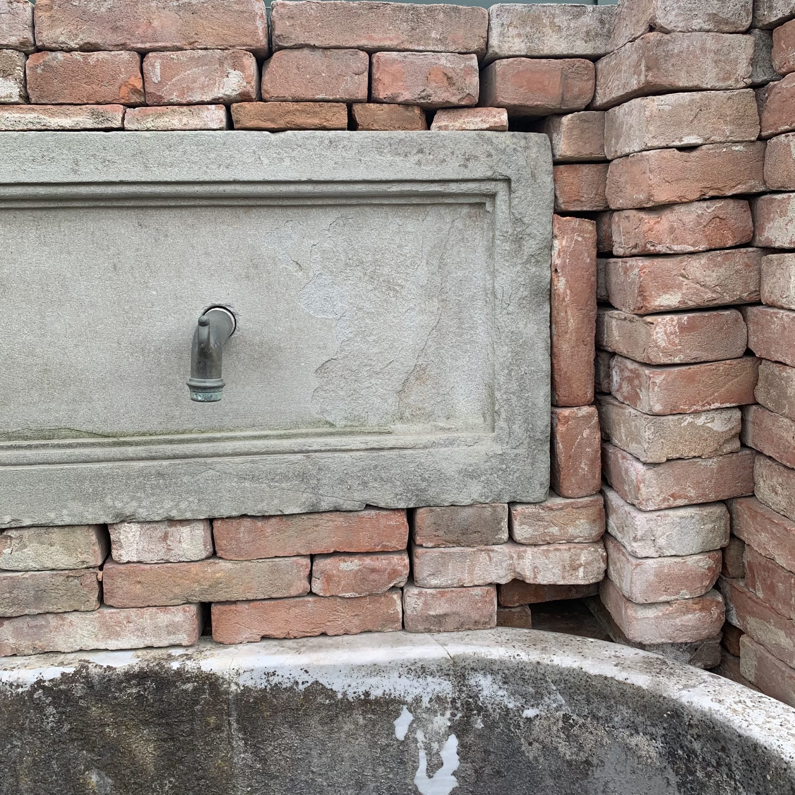 White marble wall fountain