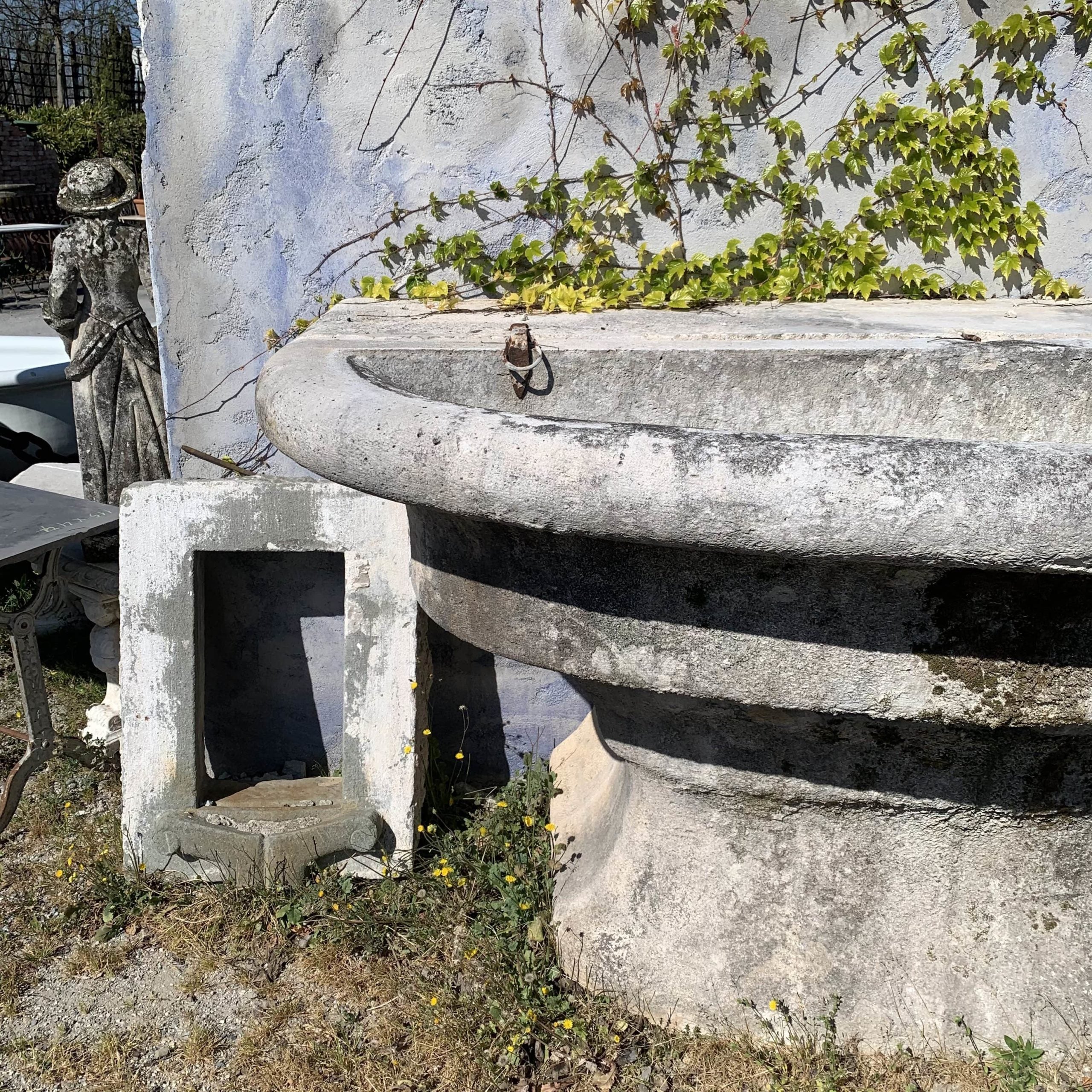 Ancient stone wall fountain from the 1700s