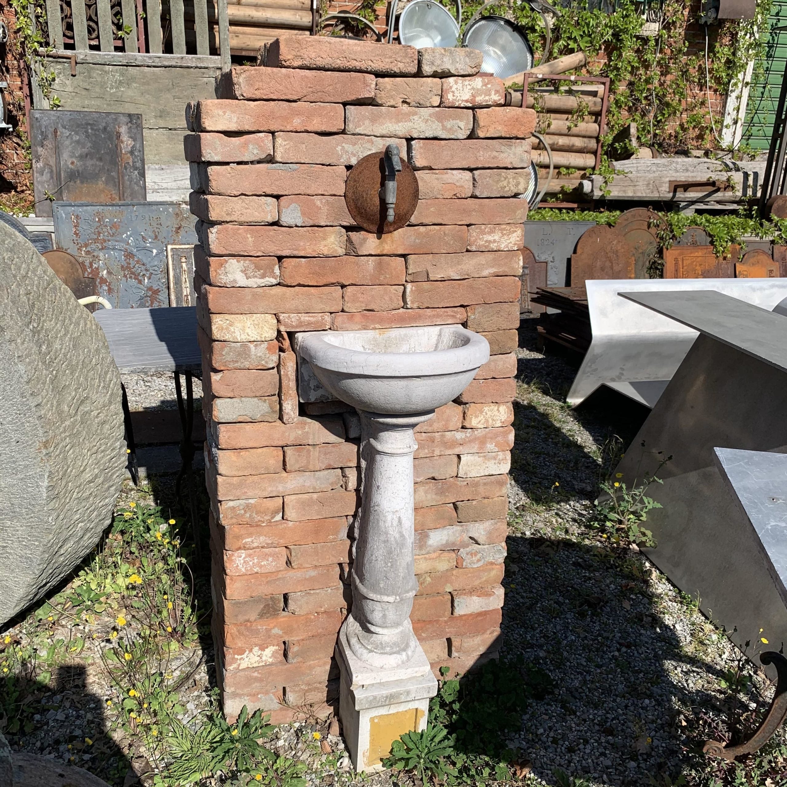Small stone wall fountain