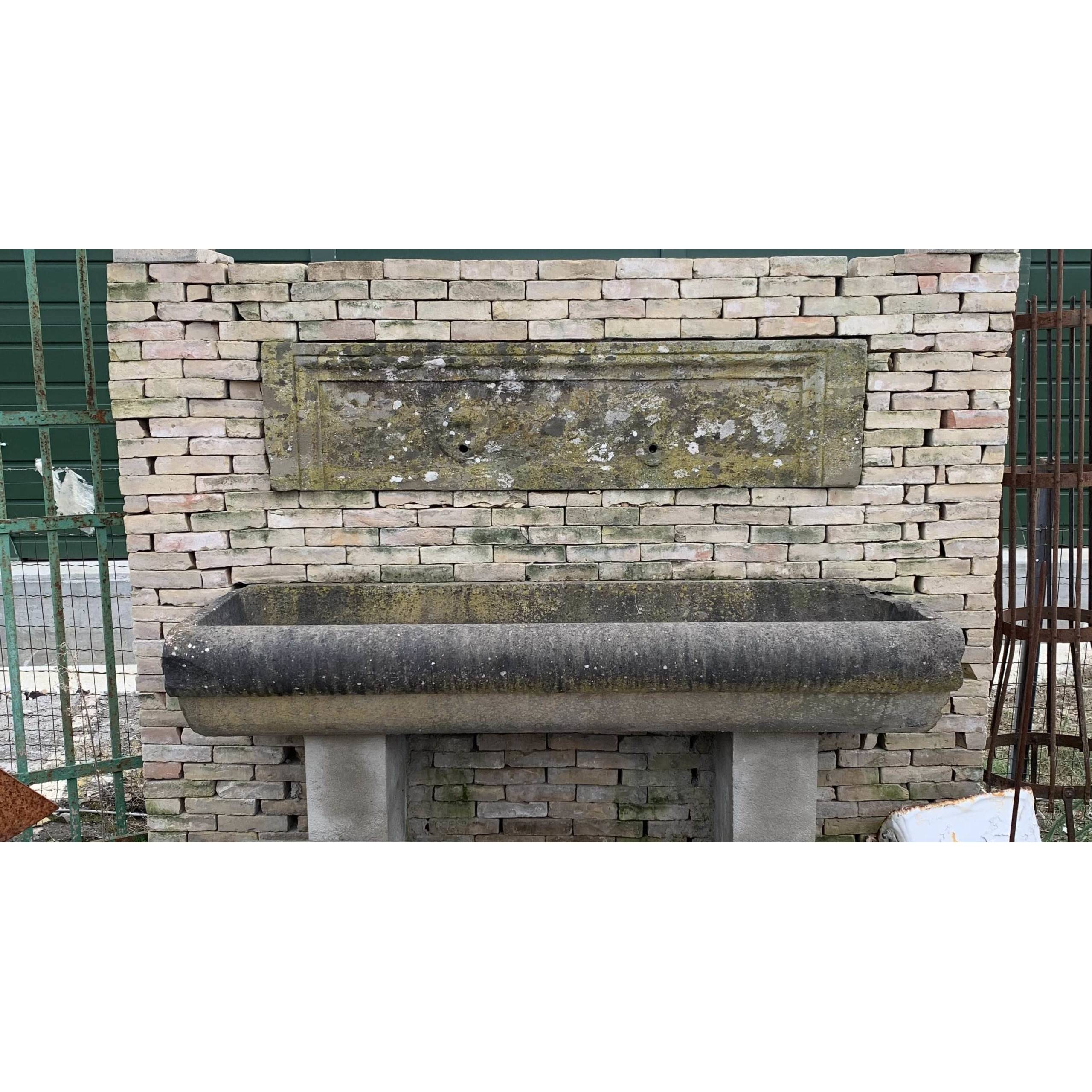 Sandstone wall-mounted bathtub