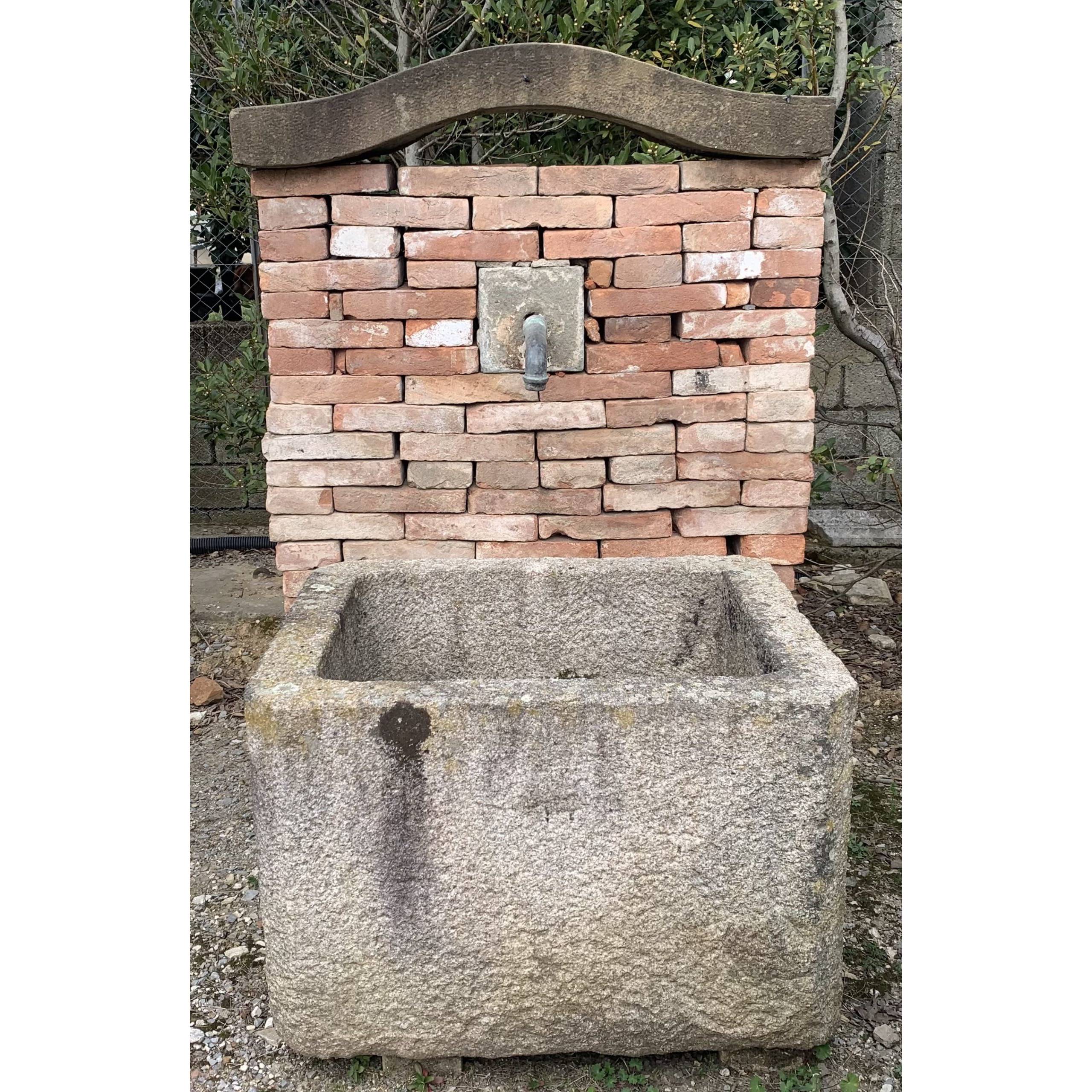 Ancient granite stone tub