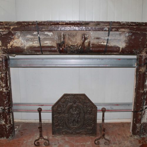 Antique gray sandstone fireplace