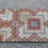 Pastina floor with red and yellow geometric design