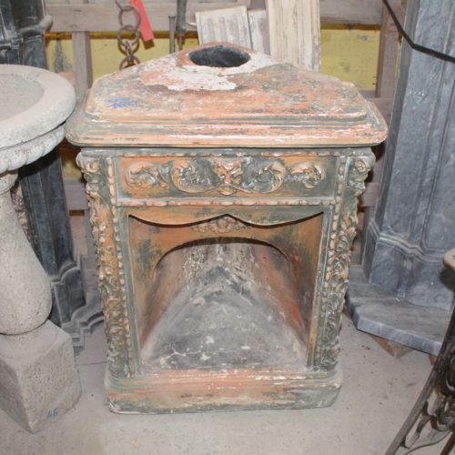 Angular terracotta fireplace